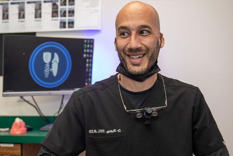 doctor discussing dental procedure information with patient