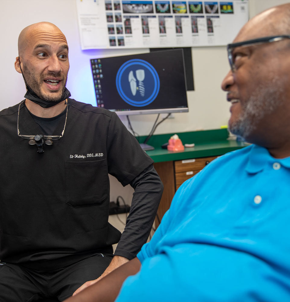 patient and doctor discussing dental procedure information