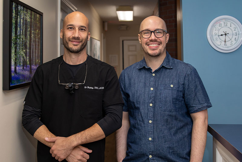 patient and doctor smiling after patient's dental procedure