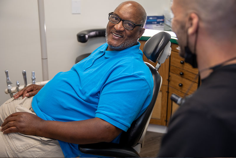 patient and doctor going over dental procedure information