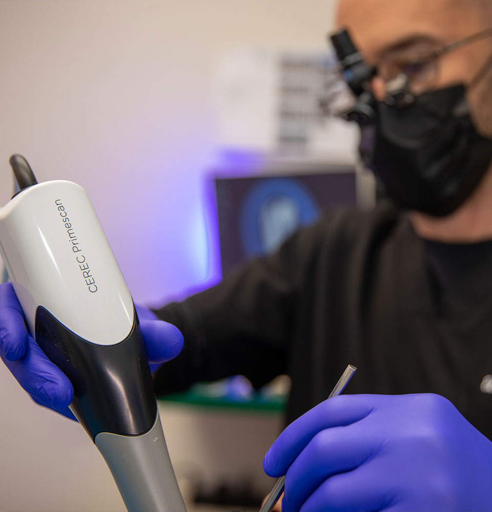 Staff member scanning for dental procedure
