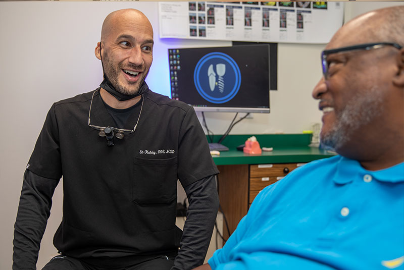patient and doctor going over dental procedure information