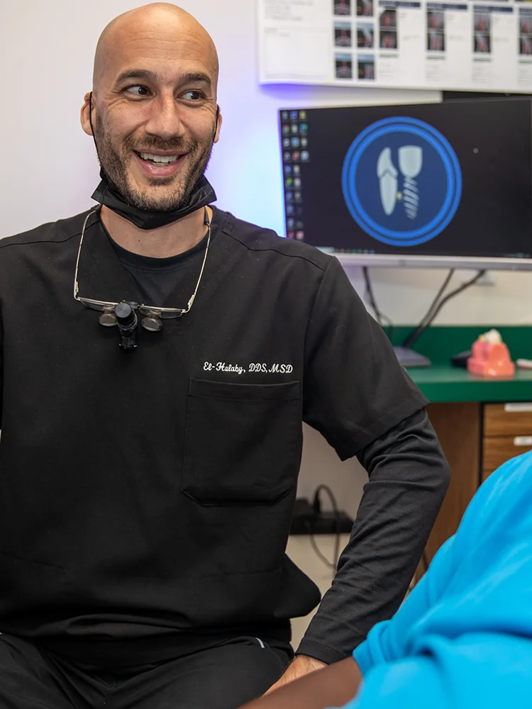 Dr. Halaby Talking With Patient